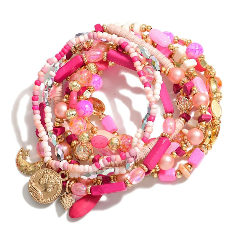 Pink Set of Nine Beaded Stretch Bracelets With Charms