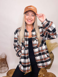 Active Basic Black and Orange Plaid Jacket with Two Side Pockets, Two Chest Pockets, a button up front and an oversized fit with a medium weight material.
