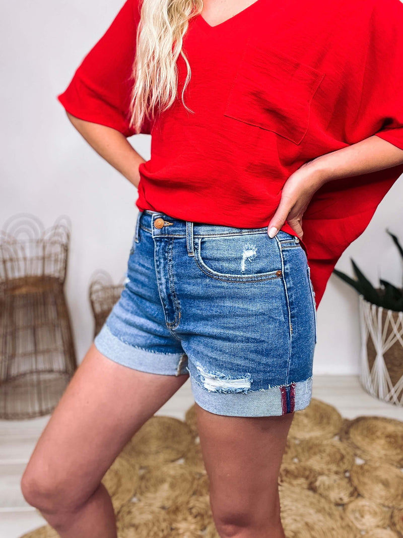 America High Rise Distressed Shorts with Red Stitch Detail