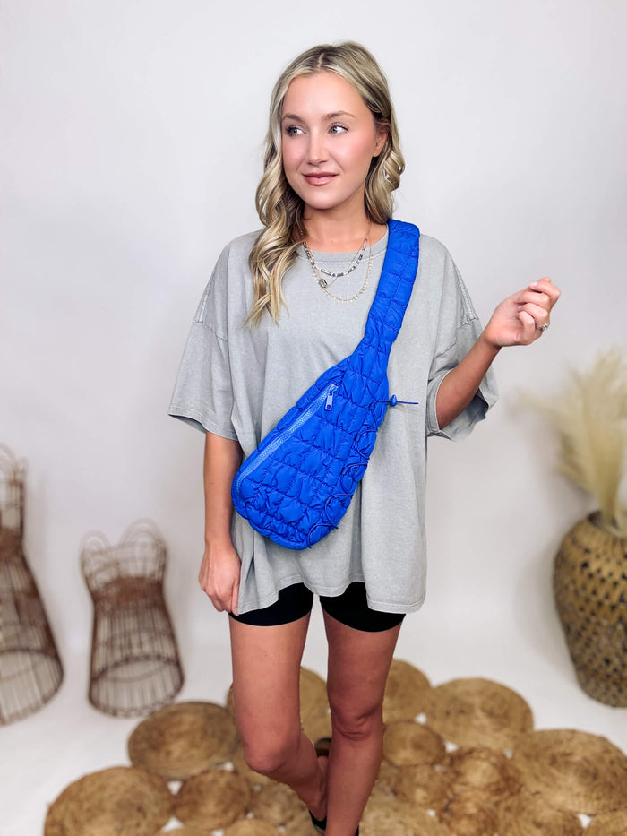 Blue Quilted Puffer Sling Bag With Adjustable Cross Body Strap & Drawstring Detail
