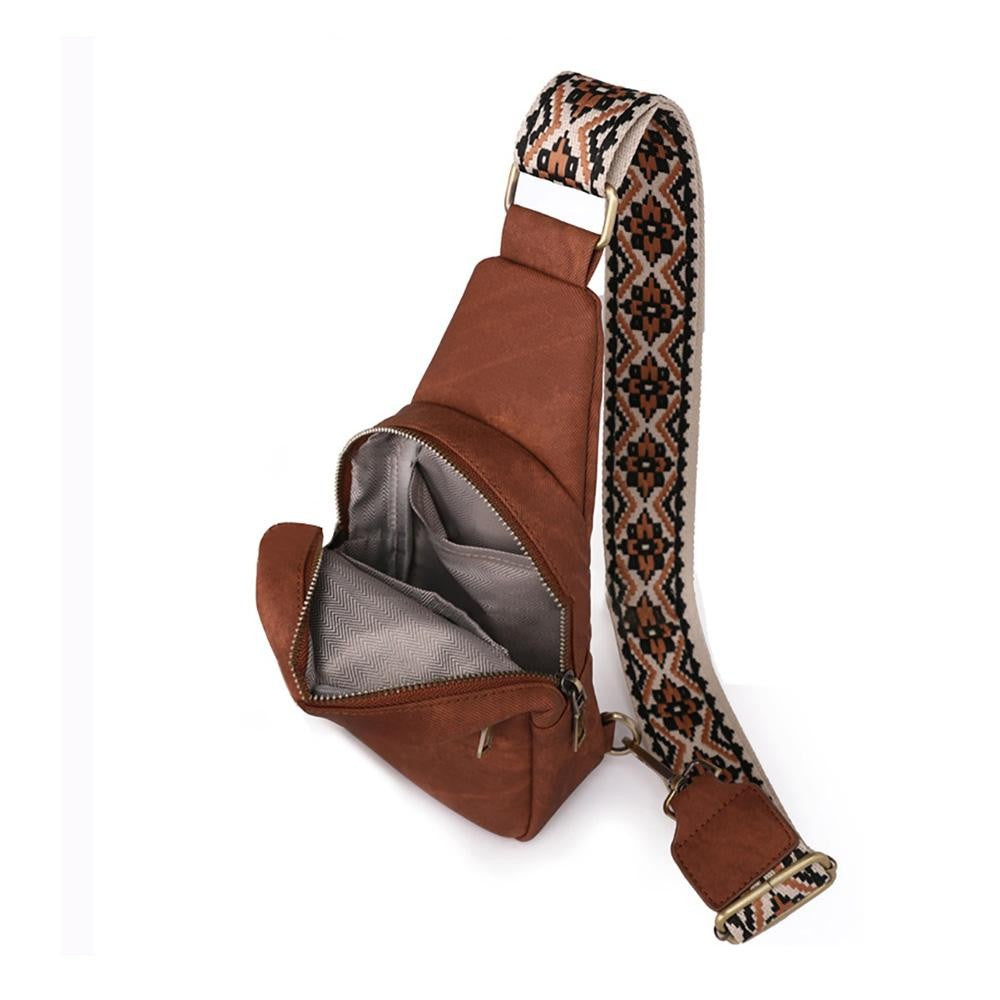 Brown Acid Washed PU Leather Sling Bag with Boho Guitar Strap Full Zipper Closure Side Adjustable Guitar Strap One Front / One Main Body Pocket Card Organizer & Open Internal Pocket Body Approximately 6" W X 9"T X 2.5" D Straps Adjustable 25-48" L 100% PU