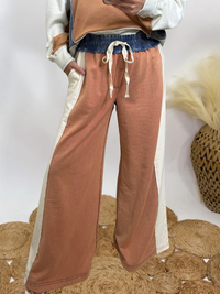 Wide leg pants with a matching top. Matching fall set. Wide leg sweatpants with elastic denim waist and drawstring and side pockets.