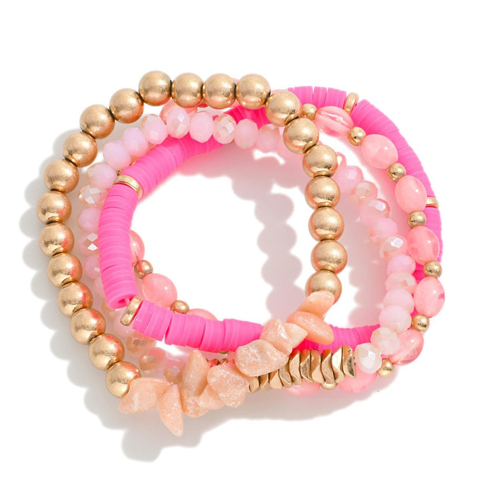 Pink Pink Set of Four Beaded Stretch Bracelets Featuring Heishi Details Approximately 2.5" D