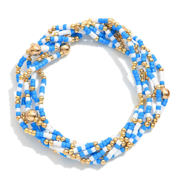 Set of Six Blue and White Beaded Stretch Bracelets With Gold Tone Bead Accents