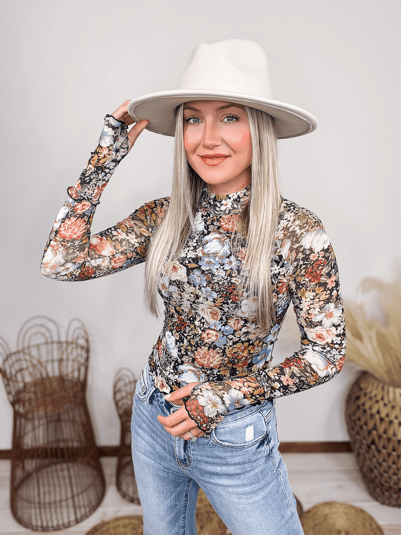 Promesa Boho Floral Print Semi-Sheer Mesh Long Sleeve Top Thumbhole Sleeves Center is Lined with Black Mesh Fitted with Slight Stretch 100% Nylon