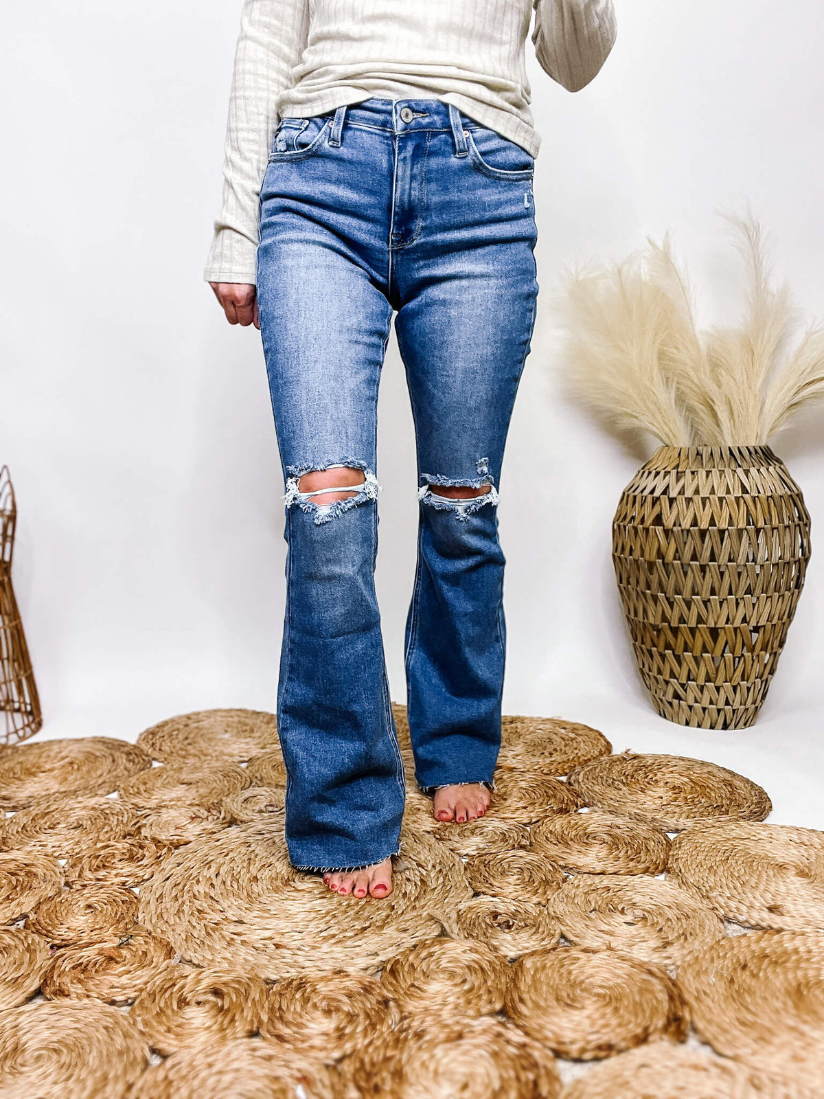 High Rise KanCan Distressed Bootcut Jeans Fitted with Comfort Stretch Raw Seam True to Size 75% Cotton, 23% Tencel, 2% Spandex 10" Rise, 31.5" Inseam