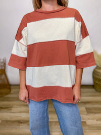 Terracotta and cream color block oversized t-shirt with short sleeves and exposed seams