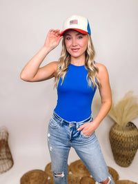 Zenana Blue Boat Neck Sleeveless Tank Bodysuit made from soft, comfortable fabric, perfect for versatile styling and pairing with the Red, White, and Blue American Flag Embroidered Trucker Hat