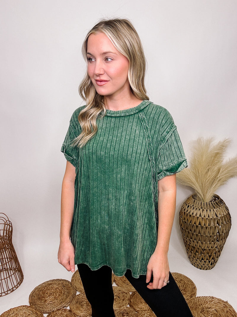 Zenana Dark Green Acid Washed Oversized Short Sleeve Top Wide Ribbed Details Exposed Seam Details Stretchy Oversized Fit 95% Rayon, 5% Spandex Brooke is 5'4 wearing size small.