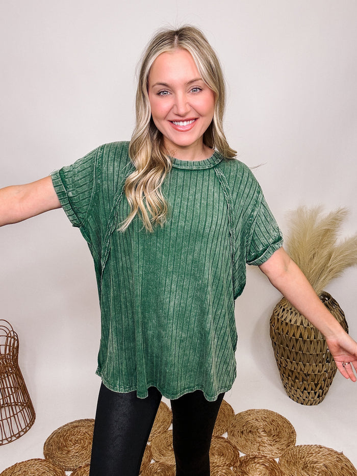 Zenana Dark Green Acid Washed Oversized Short Sleeve Top Wide Ribbed Details Exposed Seam Details Stretchy Oversized Fit 95% Rayon, 5% Spandex Brooke is 5'4 wearing size small.