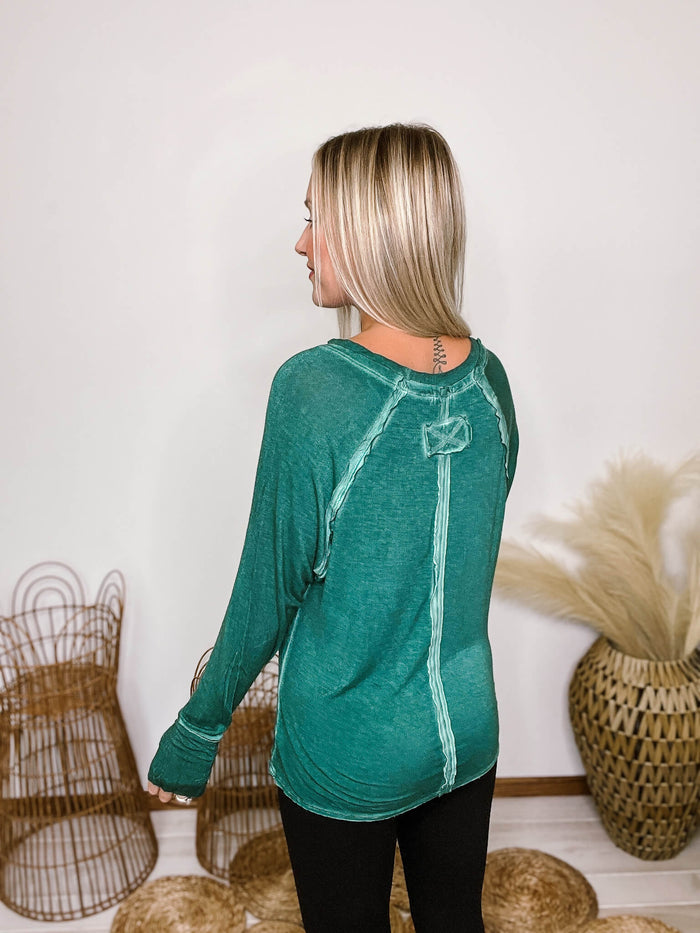 Zenana Hunter Green Mineral Washed Long Sleeve Top Thumbhole Cuffs Back Patch Exposed Seam Details Stretchy Material Relaxed Fit 95% Rayon, 5% Spandex ** Each item is unique in color/finishing due to the mineral wash.
