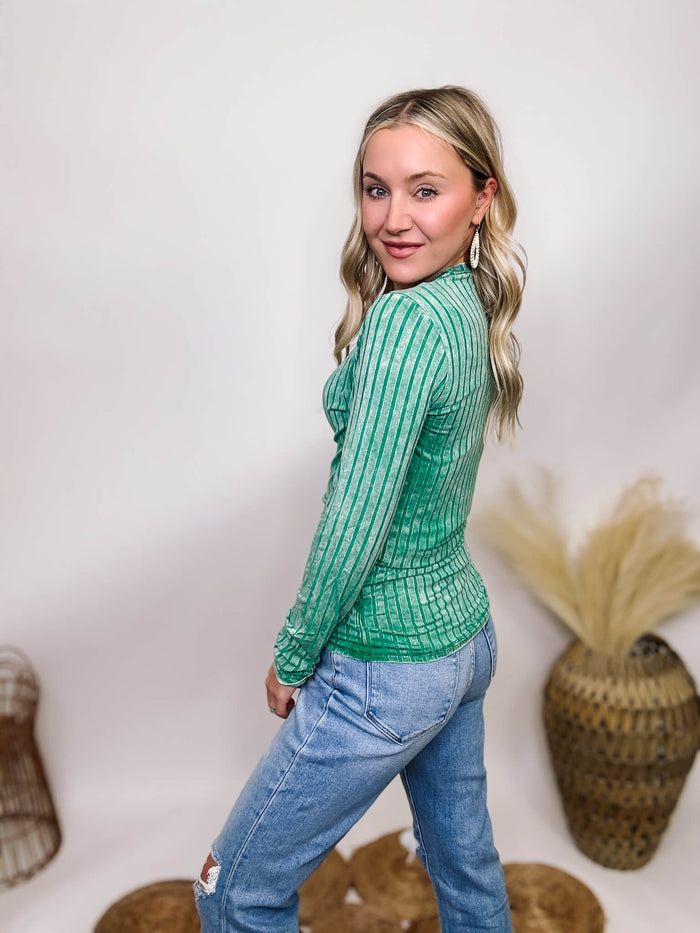 Zenana Green Acid Washed Long Sleeve Top with Wide Ribbed and Exposed Seam Details, Stretchy Fabric, and Oversized Fit. Made from 95% Rayon, 5% Spandex.