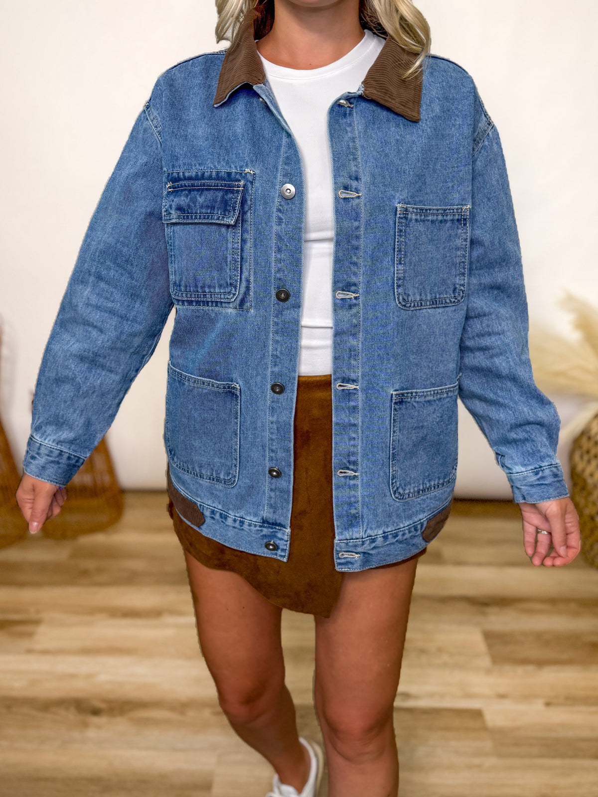 denim jacket with brown corduroy collar and accents, fall denim jacket, styled with suede wrap skort