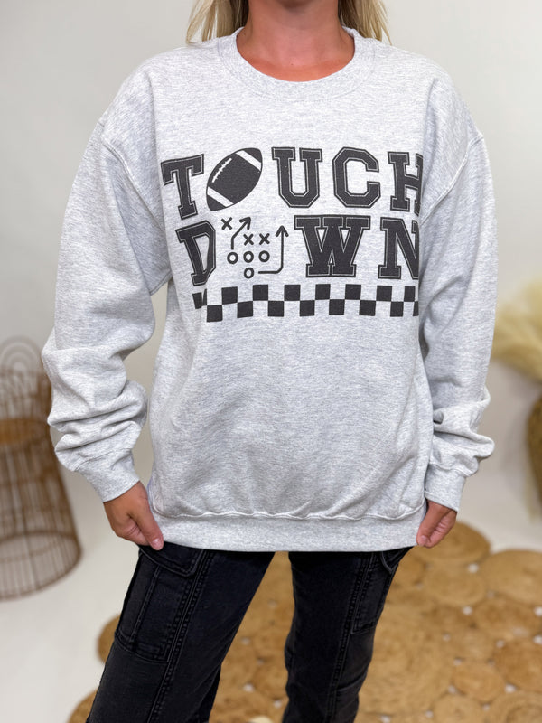 Heather gray graphic sweatshirt with “TOUCHDOWN” design featuring football and playbook print