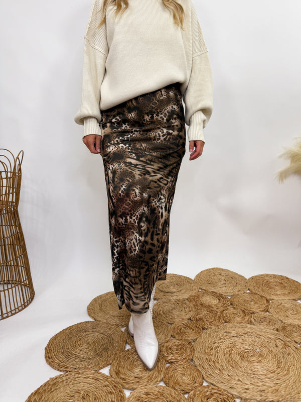 Stretchy Neutral leopard mesh skirt styled with sweater and booties