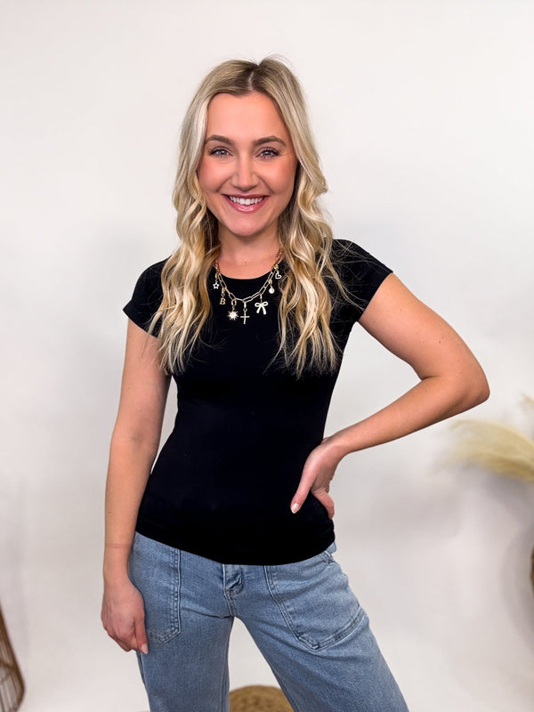 Black Short Sleeve Smoothing Seamless Top with a tailored fit, crew neckline, and ultra-smooth, stretchy fabric. Perfect for layering or wearing solo for a sleek and comfortable look.