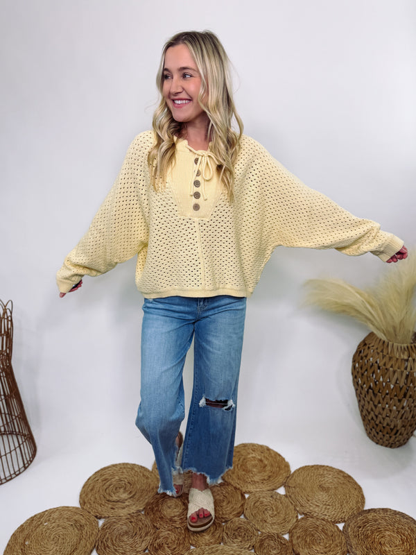 Yellow Henley button-up open knit sweater with an oversized fit, lightweight breathable cotton fabric, and a soft texture—perfect for spring and summer layering.