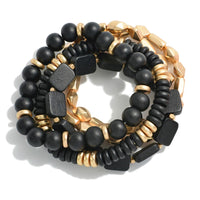 Black Set of Five Beaded Stretch Bracelets Featuring Wood and Gold Tone Metal Beads