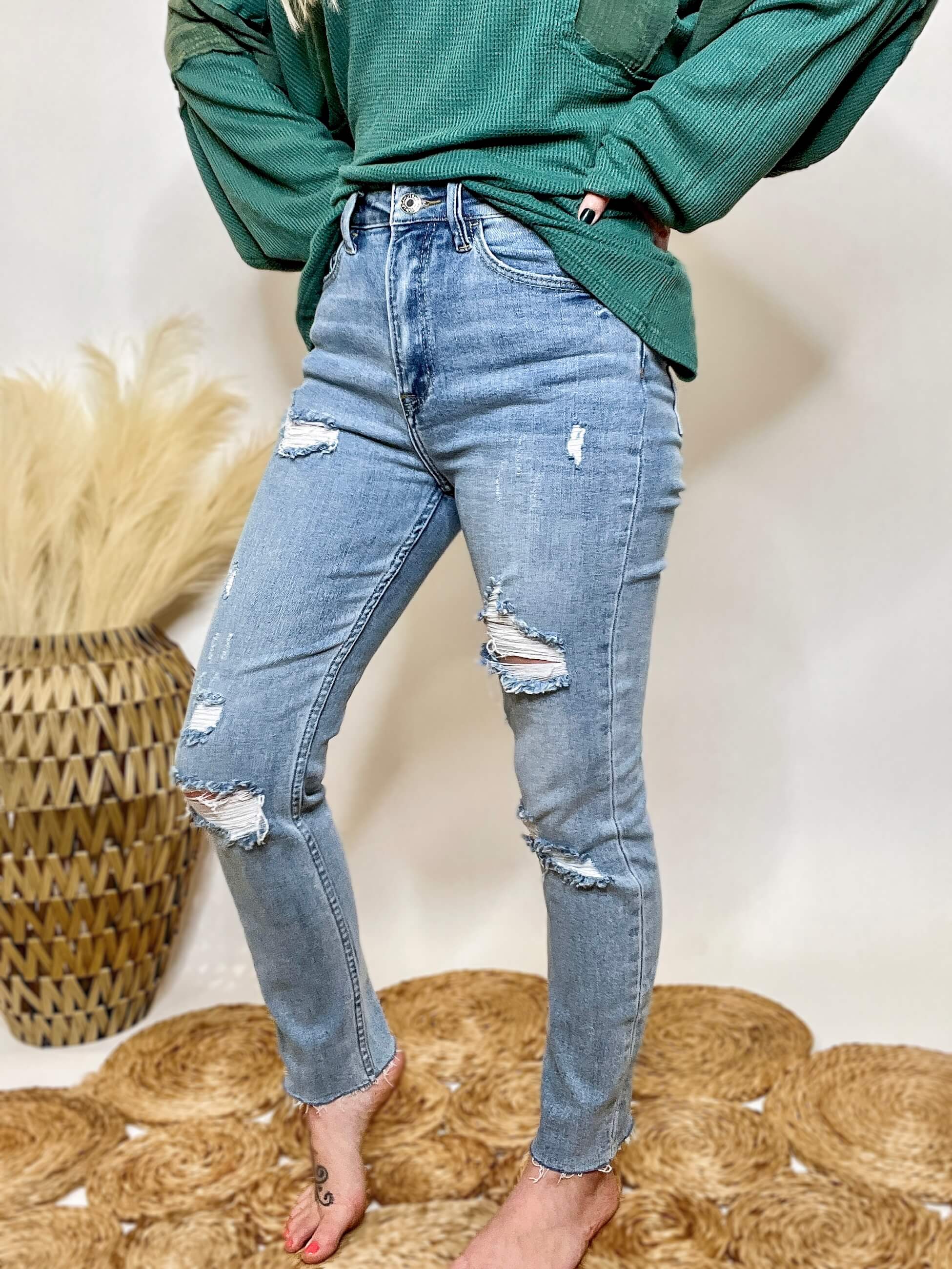 Light Wash Ultra High Rise Distressed Skinny Jeans with Raw Hem