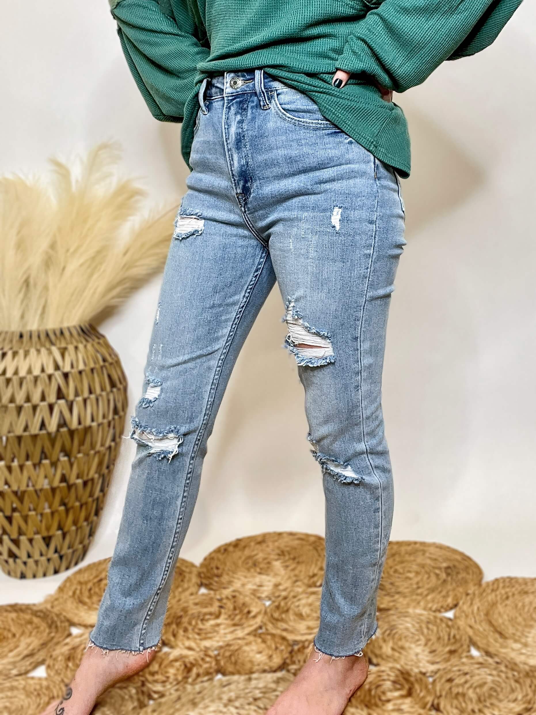 Light Wash Ultra High Rise Distressed Skinny Jeans with Raw Hem